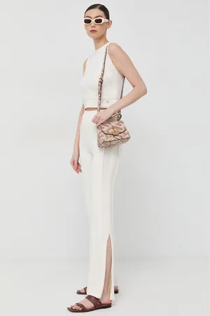 Guess Kalhoty s příměsí hedvábí barva, high waist