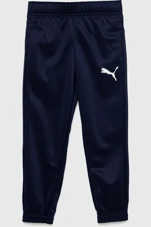 PUMA Dětské tepláky ACTIVE Tricot Pants cl B tmavomodrá barva, hladké