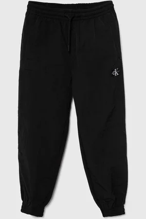 Calvin Klein Dětské tepláky barva, hladké