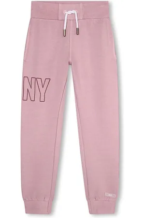 DKNY Dětské bavlněné tepláky barva, s potiskem