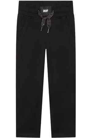 DKNY Dětské bavlněné tepláky barva