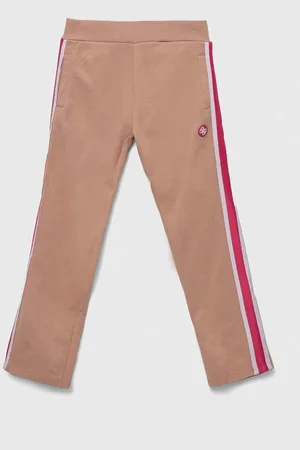 Guess Dětské bavlněné tepláky barva, s aplikací