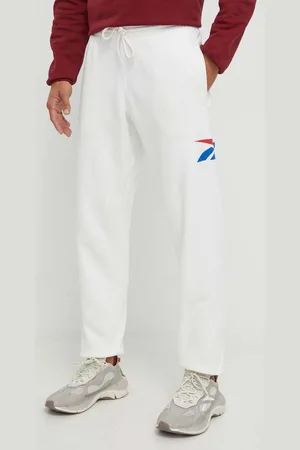 Reebok Tepláky barva, s potiskem