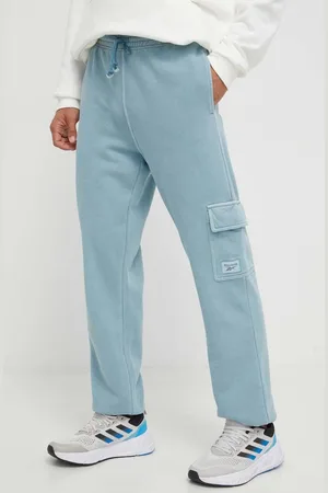 Reebok Tepláky s aplikací