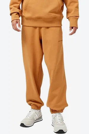New Balance Bavlněné tepláky barva
