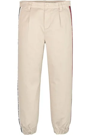 Tommy Hilfiger Dětské kalhoty barva, hladké