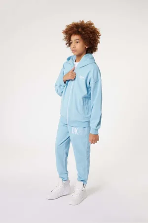 DKNY Dětské bavlněné tepláky s potiskem