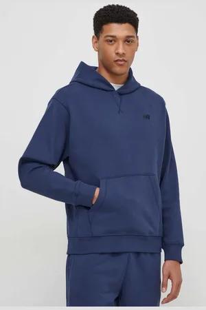 New Balance Bavlněná mikina MT41534NNY pánská, tmavomodrá barva, s kapucí, s aplikací