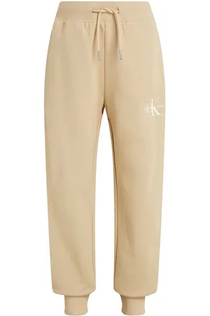 Calvin Klein Dětské bavlněné tepláky MONOGRAM LOGO barva, IU0IU00285