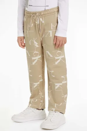 Calvin Klein Dětské bavlněné tepláky TERRY JOGGER barva, IB0IB02124