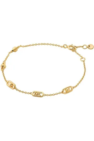 Michael Kors Pozlacený stříbrný náramek MKC173600710