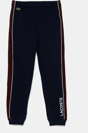 Lacoste Dětské tepláky tmavomodrá barva, vzorované, XJ2452