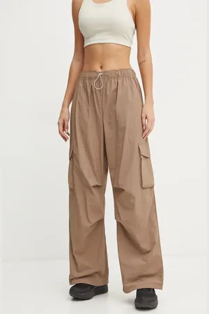 New Balance Kalhoty dámské, barva, široké, high waist, WP43534LMR