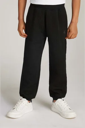 Calvin Klein Dětské tepláky VERTICAL QUILTED barva, hladké, IB0IB02192