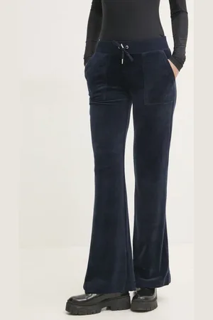 Juicy Couture Velurové teplákové kalhoty LAYLA POCKET LR tmavomodrá barva, JCSEBJ001