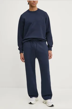 Abercrombie & Fitch Tepláky tmavomodrá barva, hladké, KI134-4100