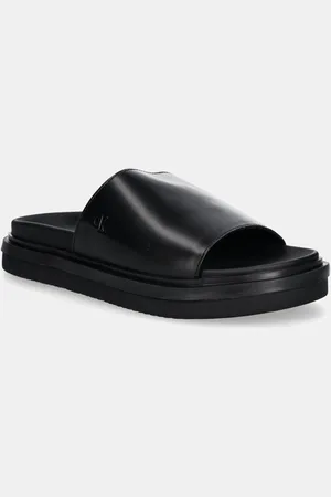 Calvin Klein Pantofle FLAT MOLDED SANDAL SLIDE dámské, šedá barva, YW0YW01710