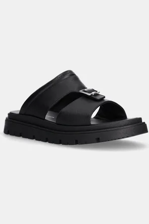 Tommy Hilfiger Kožené pantofle barva, T4B2-33948