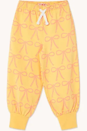 Tiny Cottons Dětské tepláky BOWS SWEATPANT barva, vzorované, SS25-057