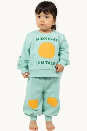 Tiny Cottons Kojenecké bavlněné tepláky SUN TALES GRAPHIC BABY SWEATPANT barva, s potiskem, SS25-106