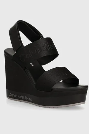 Calvin Klein Sandály WEDGE SANDAL WEBBING IN MR barva, YW0YW01360