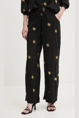 Never Fully Dressed Kalhoty Gold Sun Elissa dámské, barva, široké, high waist, NFDTR405