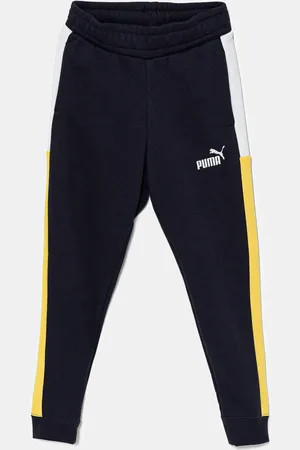 PUMA Dětské tepláky ESS BLOCK Sweatpants TR tmavomodrá barva, vzorované, 685820