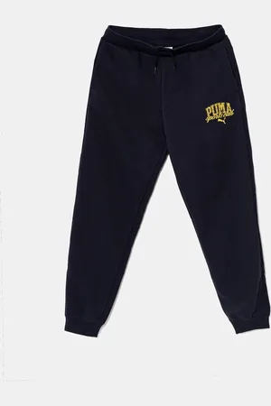 PUMA Dětské tepláky CLASS Sweatpants TR tmavomodrá barva, s potiskem, 685800