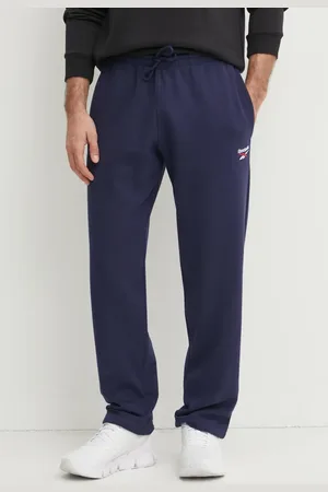 Reebok Tepláky Identity tmavomodrá barva, hladké, 100202824