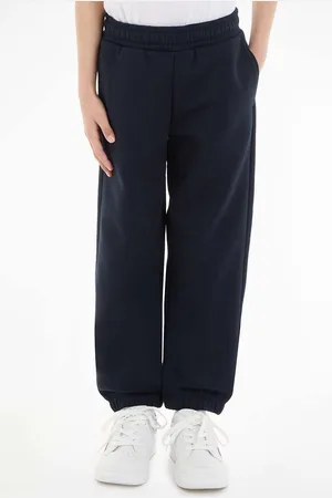 Tommy Hilfiger Dětské tepláky tmavomodrá barva, melanžové