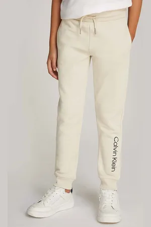 Calvin Klein Dětské bavlněné tepláky REGULAR JOGGER barva, s potiskem, IU0IU00681
