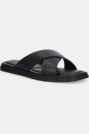Calvin Klein Kožené pantofle CRISS CROSS SANDAL pánské, barva, HM0HM01737