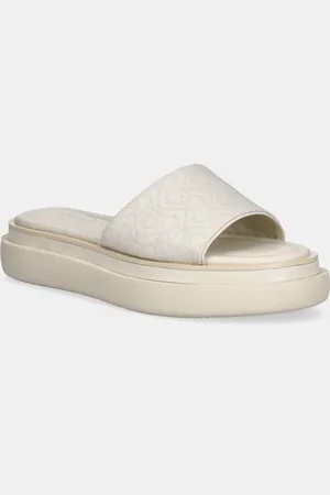 Calvin Klein Pantofle FLATFORM SLIDE - JACQ dámské, barva, na platformě, HW0HW02461