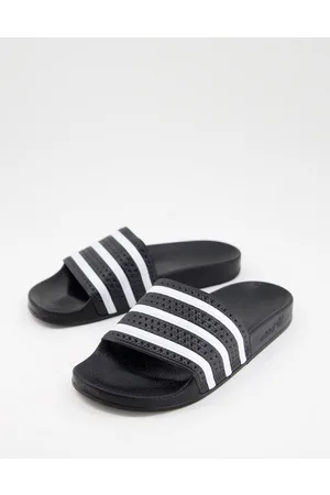 adidas Adilette sliders in and white