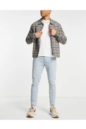 Topman Stretch tapered jeans in light wash tint