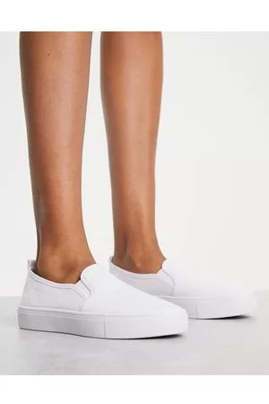 ASOS Dotty slip on plimsolls in