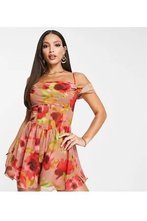 ASOS ASOS DESIGN Tall corset detail cowl neck playsuit in blurred floral print