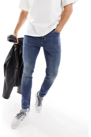 ASOS Skinny jeans with paint detail in mid wash