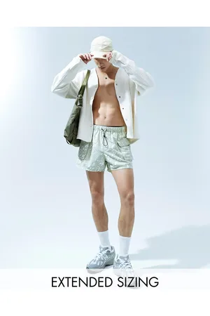 ASOS Swim shorts in short length with camo print in khaki
