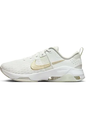 Nike Zoom Bella 6 premium trainers in and gold