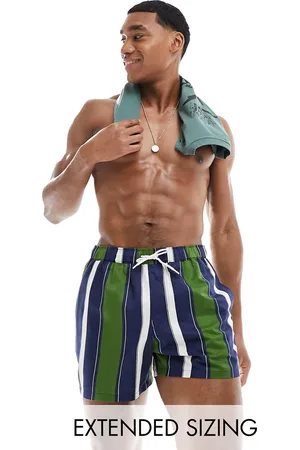 ASOS Swim shorts in short length in green and stripe
