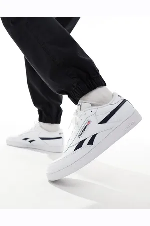 Reebok Club C Revenge trainers in and navy