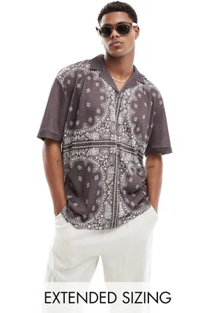 ASOS Oversized revere polo in paisley all over print