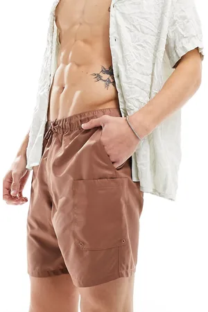 ASOS Swim shorts in mid length with cargo pocket detail in