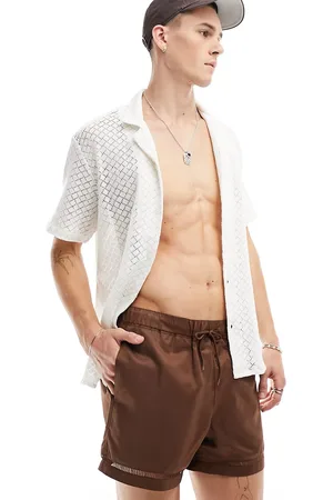 ASOS Swim shorts in short length with hem details in