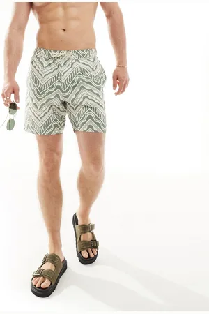ASOS Swim shorts in short length in geo print