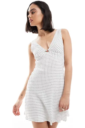 Bershka Tie back mini dress in white and spot