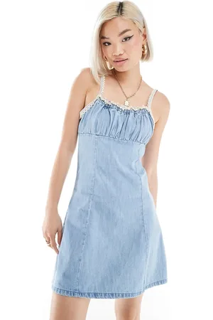 ASOS Denim mini cami dress with ruched bust and crochet strap detail in mid wash