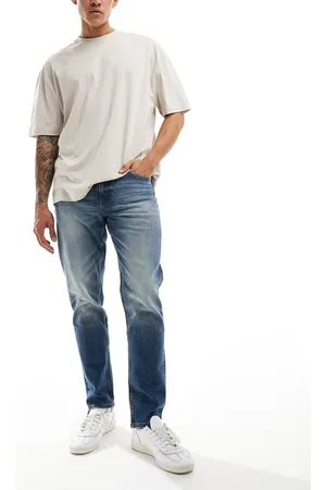ASOS Stretch tapered jeans in vintage mid wash
