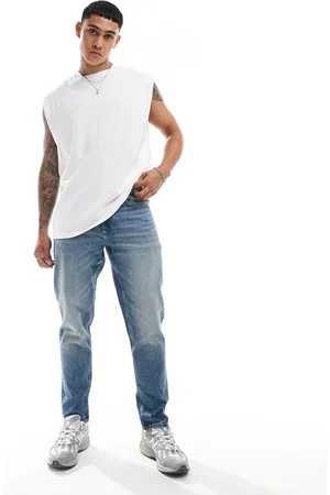 ASOS Stretch tapered jeans in light wash